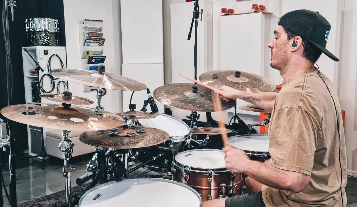 Dave recording an acoustic drum kit in the studio