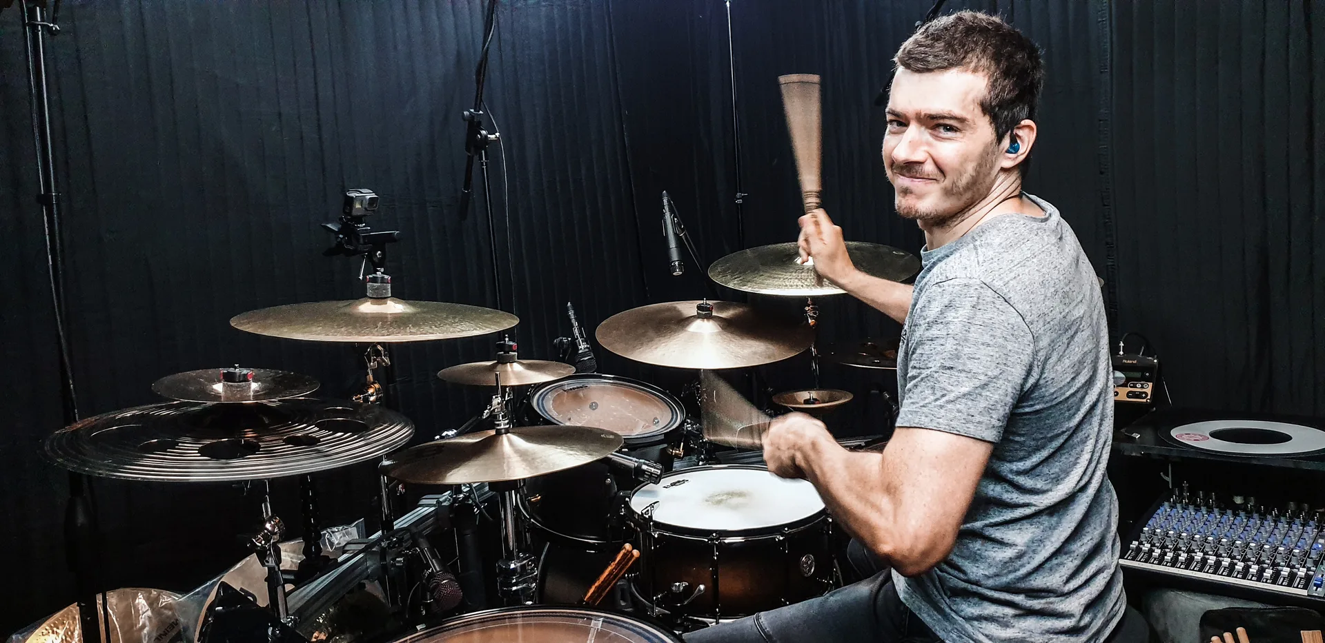 Dave D’Amore behind an acoustic drum kit in the studio